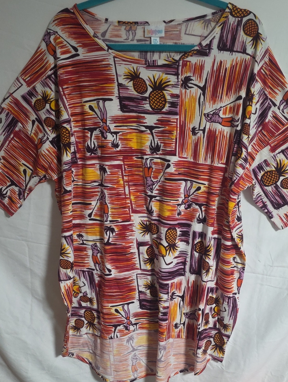 LuLaRoe Short Sleeve Tunic Top in Orange, Yellow & Purple Tropical Print